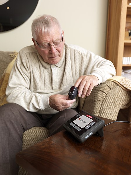 File:Elderly Man Using Pulse Oximeter.jpg