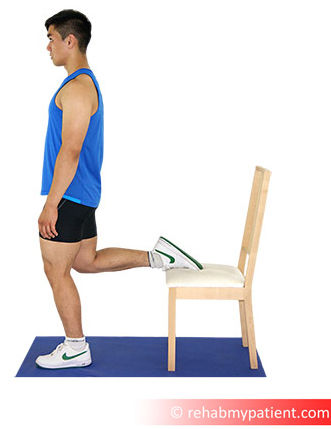 File:Quadriceps Stretch with Chair.jpeg
