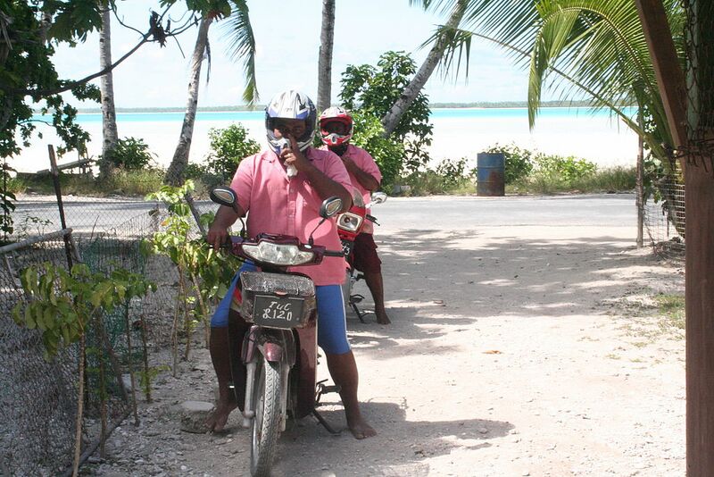 File:Community health workers specialising in treating TB prepare to make their rounds on the motorbikes. Kiribati 2009. Photo- AusAID (10687431295).jpg
