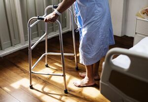 A-patient-holding-a-walking-frame.jpg