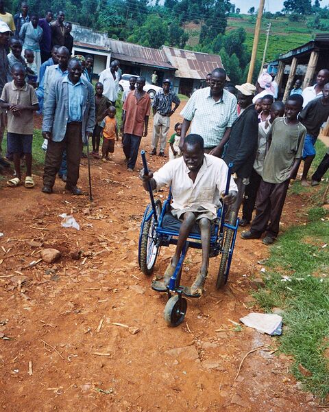 File:Leveraged wheelchair on path.jpeg
