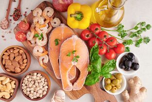 Balanced-nutrition-concept-clean-eating-flexitarian-mediterranean-diet-top-view-flat-nutrition-clean-eating-food-concept-diet-plan-with-vitamins-minerals-salmon-shrimp-mix-vegetables.jpg