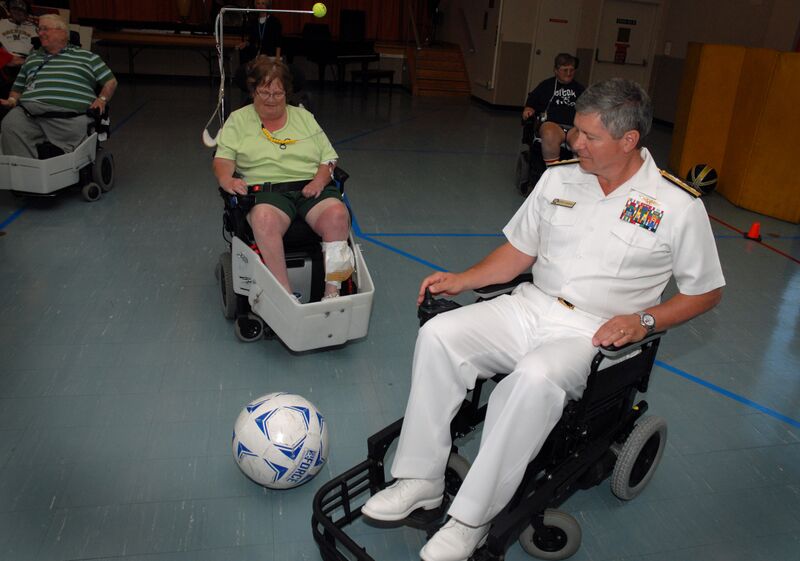 File:US Navy 100607-N-5208T-001 Rear Adm. Gerald R. Beaman plays a power chair soccer match with rehabilitating veterans at the Milwaukee VA Medical Center.jpg